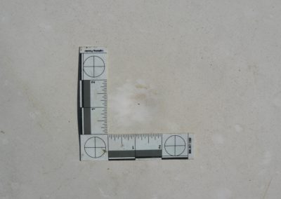 Double Measuring Tape Checking Roof Dent