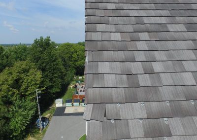 Roof With Misaligned Damaged Tiles