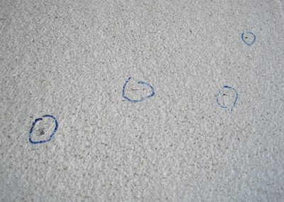 SPF Roofing Cracks Marked With Blue Circles
